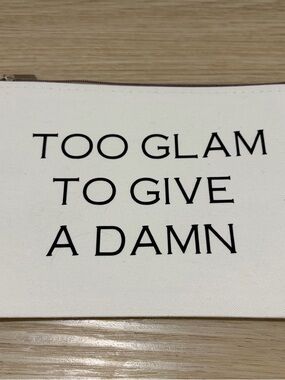 White Canvas Zip Makeup Pouch with Bold Black Slogan. 8x6”
